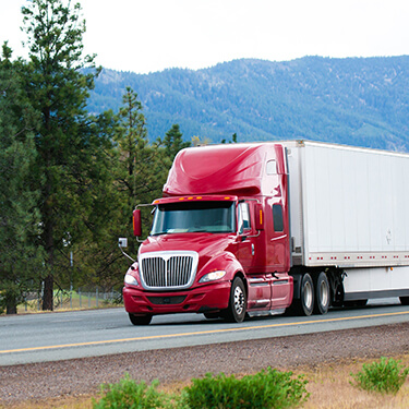 Red Freight Truckload on Highway Intra-Mexico Freight Shipping