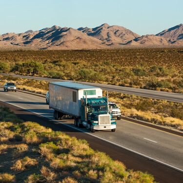 Green Semi Truck Cross Border Freight from or to Arizona