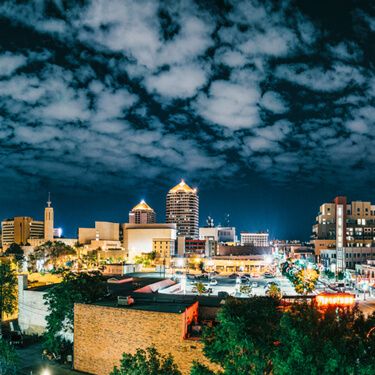 Cross Border Freight From or To New Mexico Albuquerque night Skyline