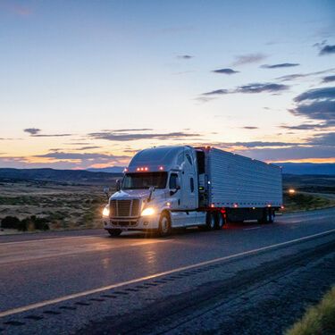 Nogales Cross Border Shipping White Semi Truck on Highway